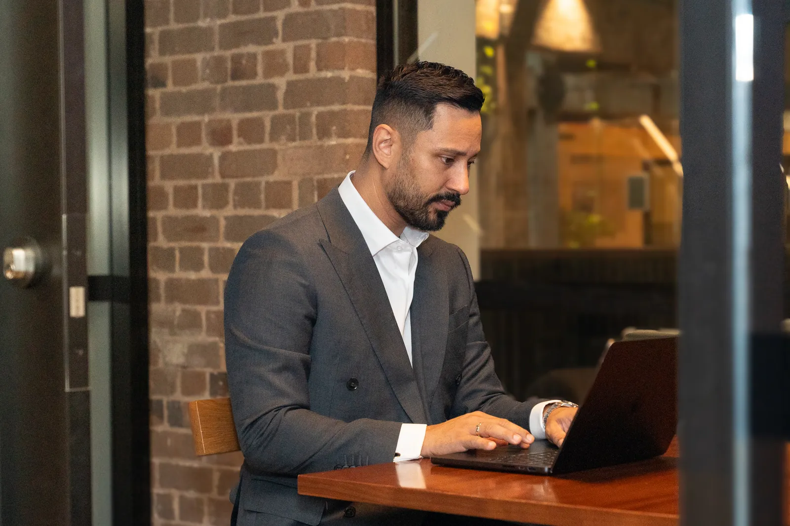 Professional reviewing a high-value project contract and insurance requirements