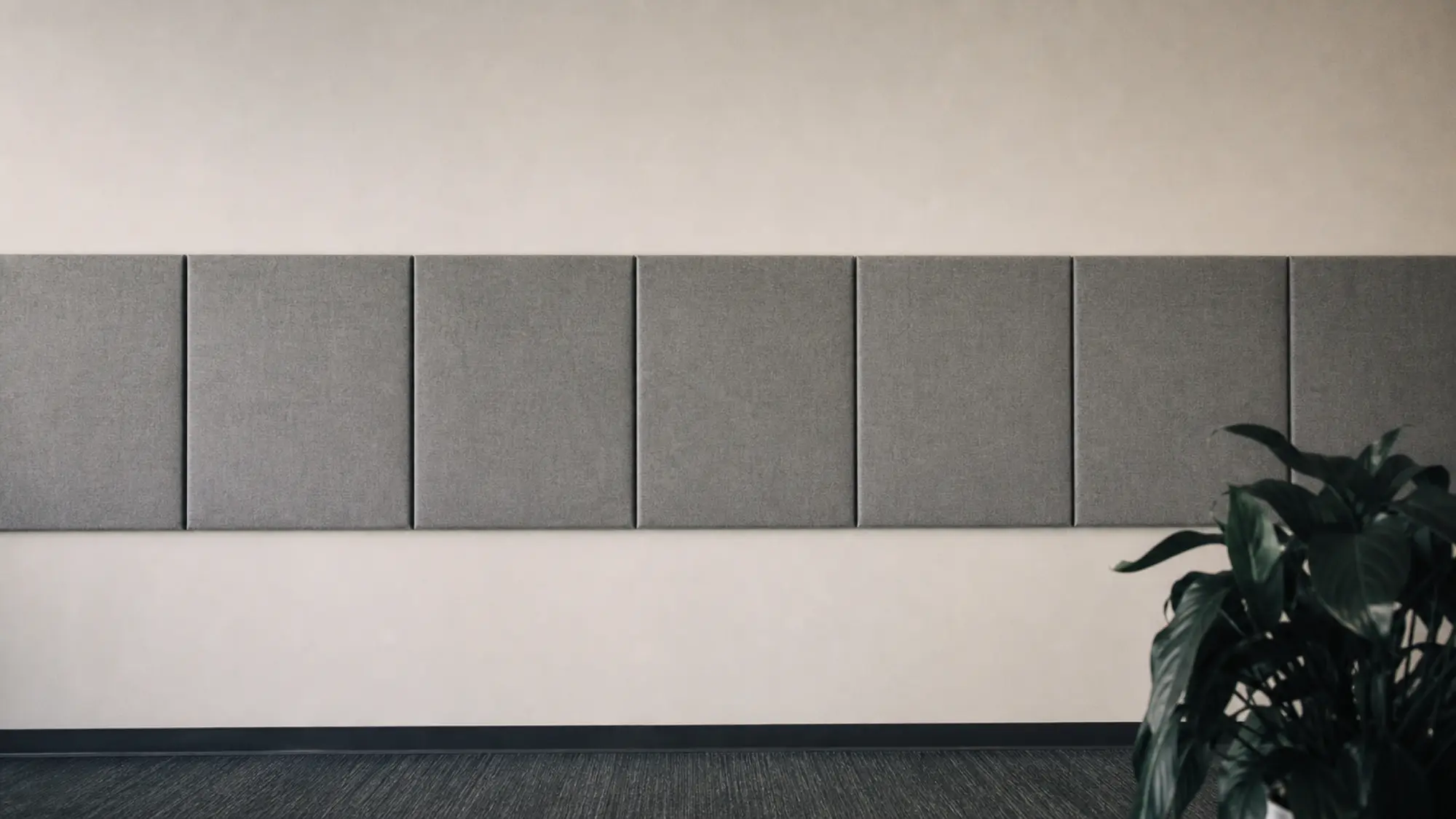 Fabric acoustic absorption panels along an office wall, acoustic consultant professional indemnity quote
