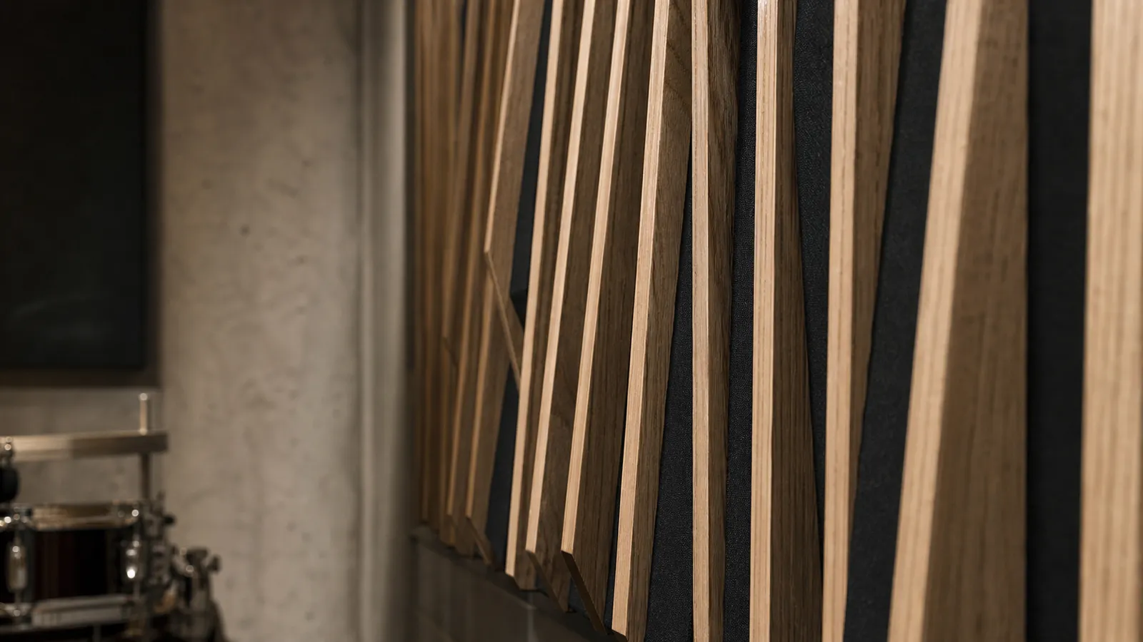 Timber acoustic diffuser wall detail representing acoustic design consulting and PI insurance risk