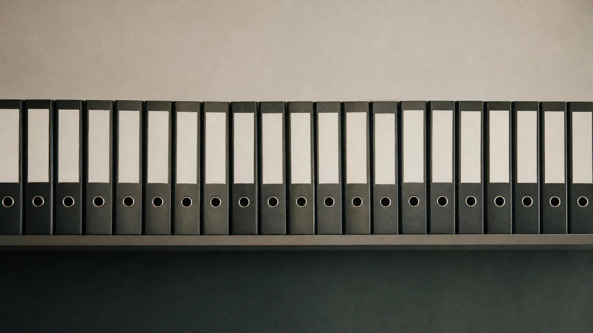 Lever-arch folders lined on a shelf, bookkeeper professional indemnity insurance quote
