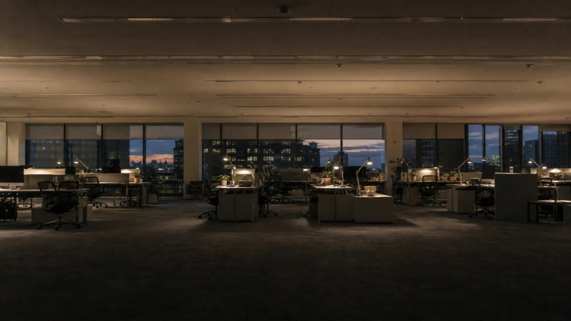 Empty open-plan office in the evening, a workplace protected by employment practices liability insurance