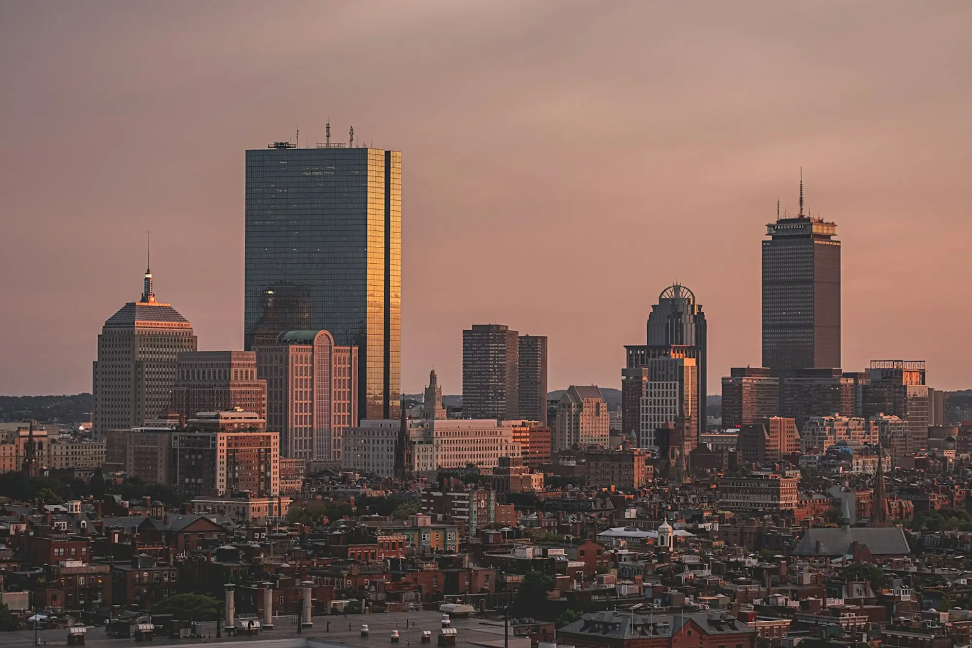Business district at dusk representing the protection of business owners and their families