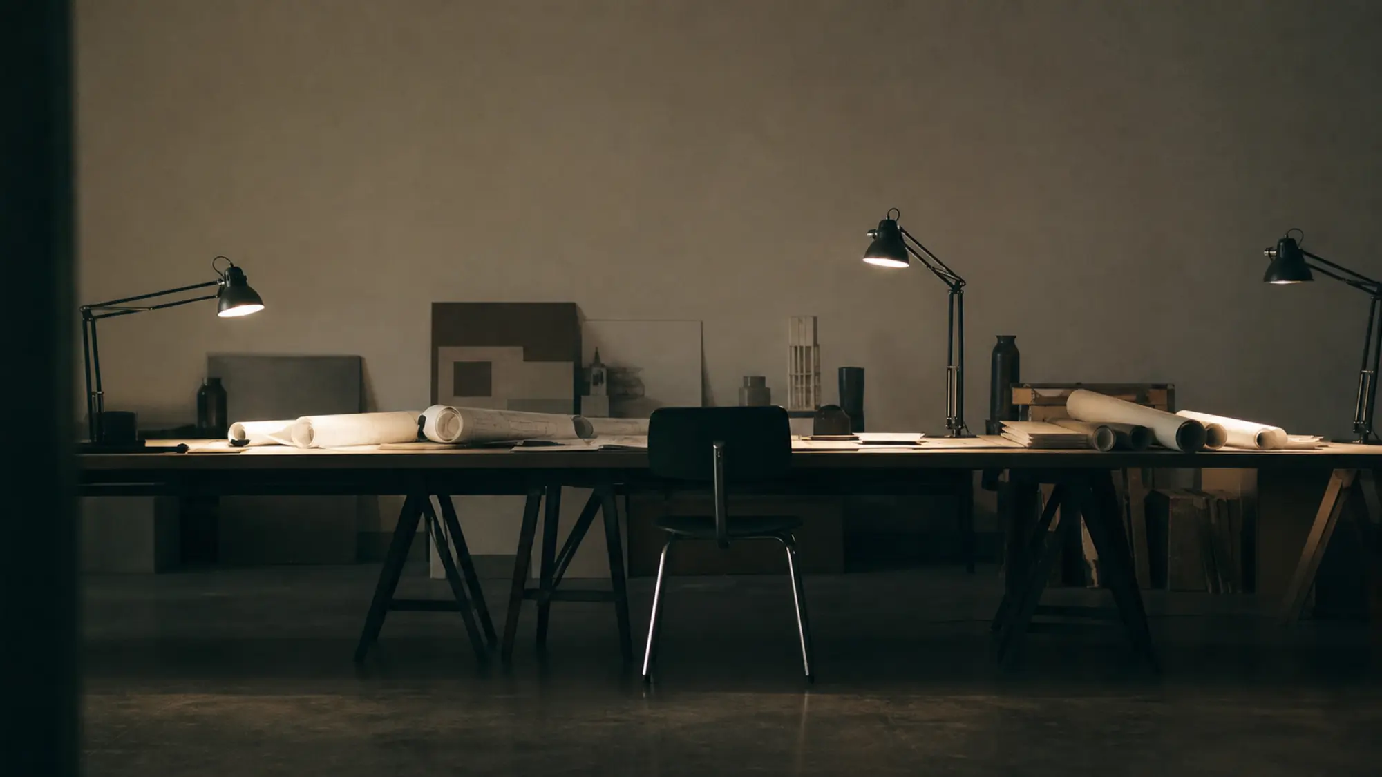 Design studio plan table at evening - insurance for drafting and design consultants