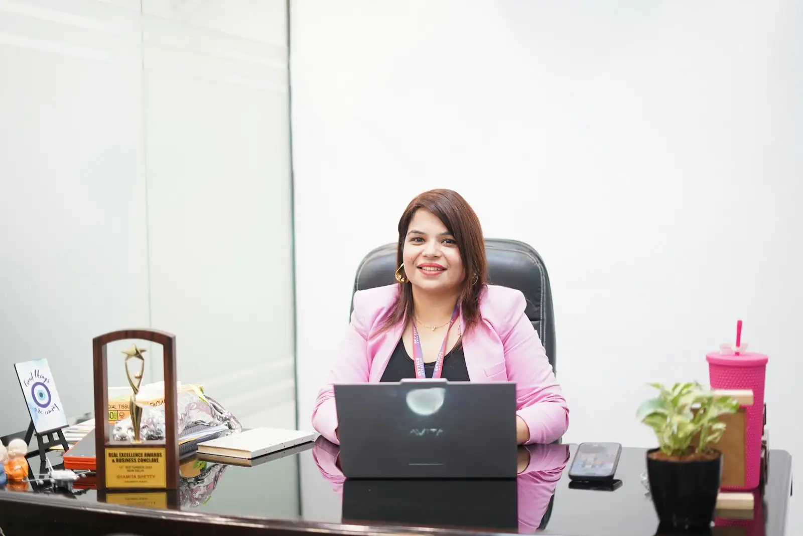 Business owner reviewing insurance documents at their desk