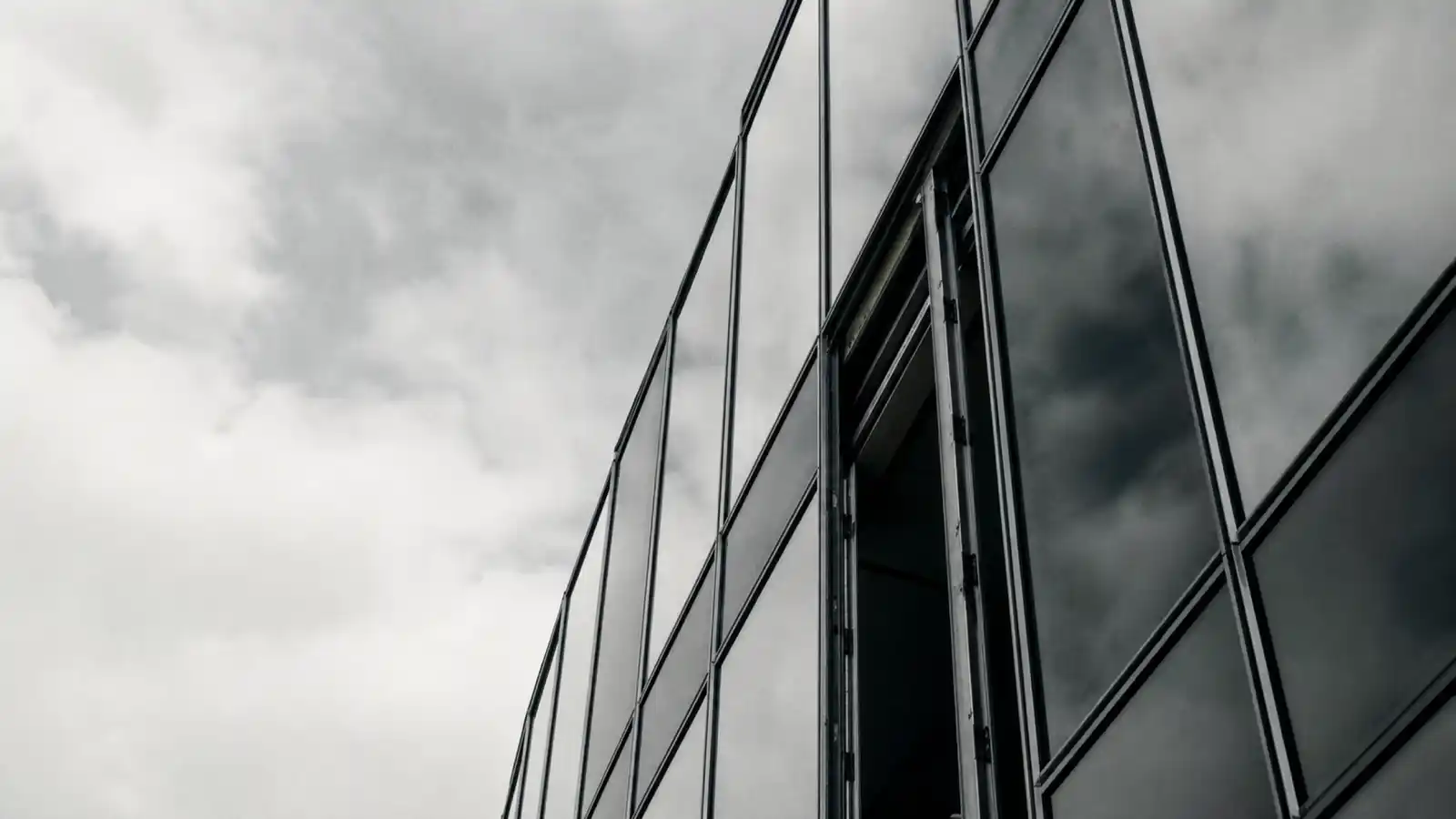 Curtain wall glazing panels mid-installation - facade engineer insurance