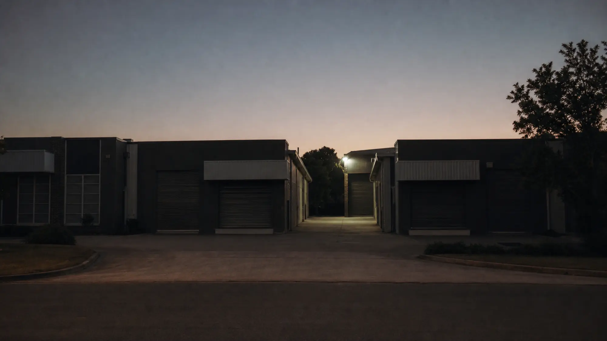 Strata industrial estate at dusk, get an industrial warehouse strata insurance quote