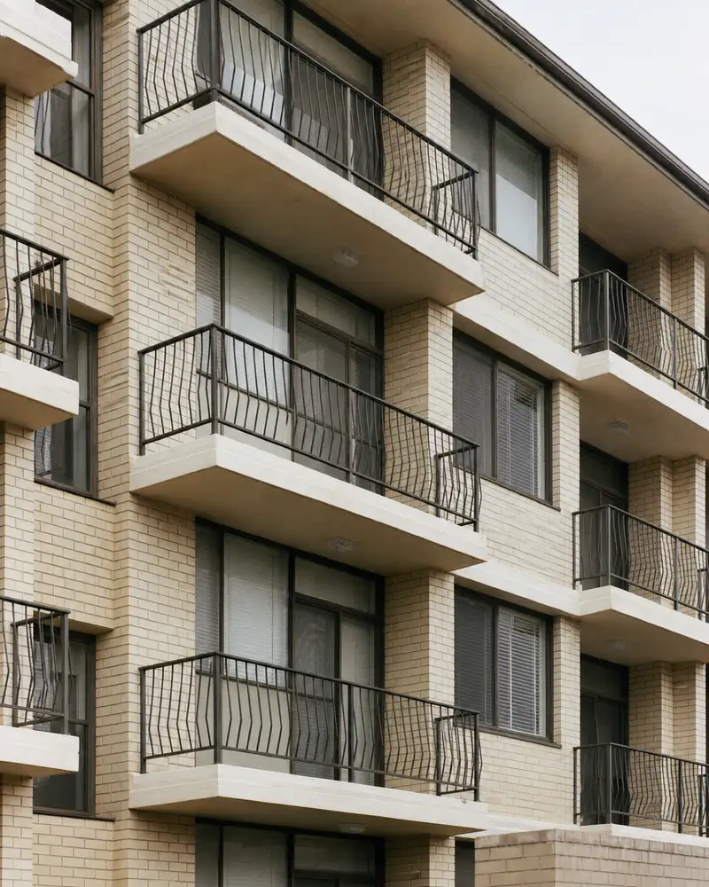 Three-storey walk-up apartment building insured under a non-strata policy