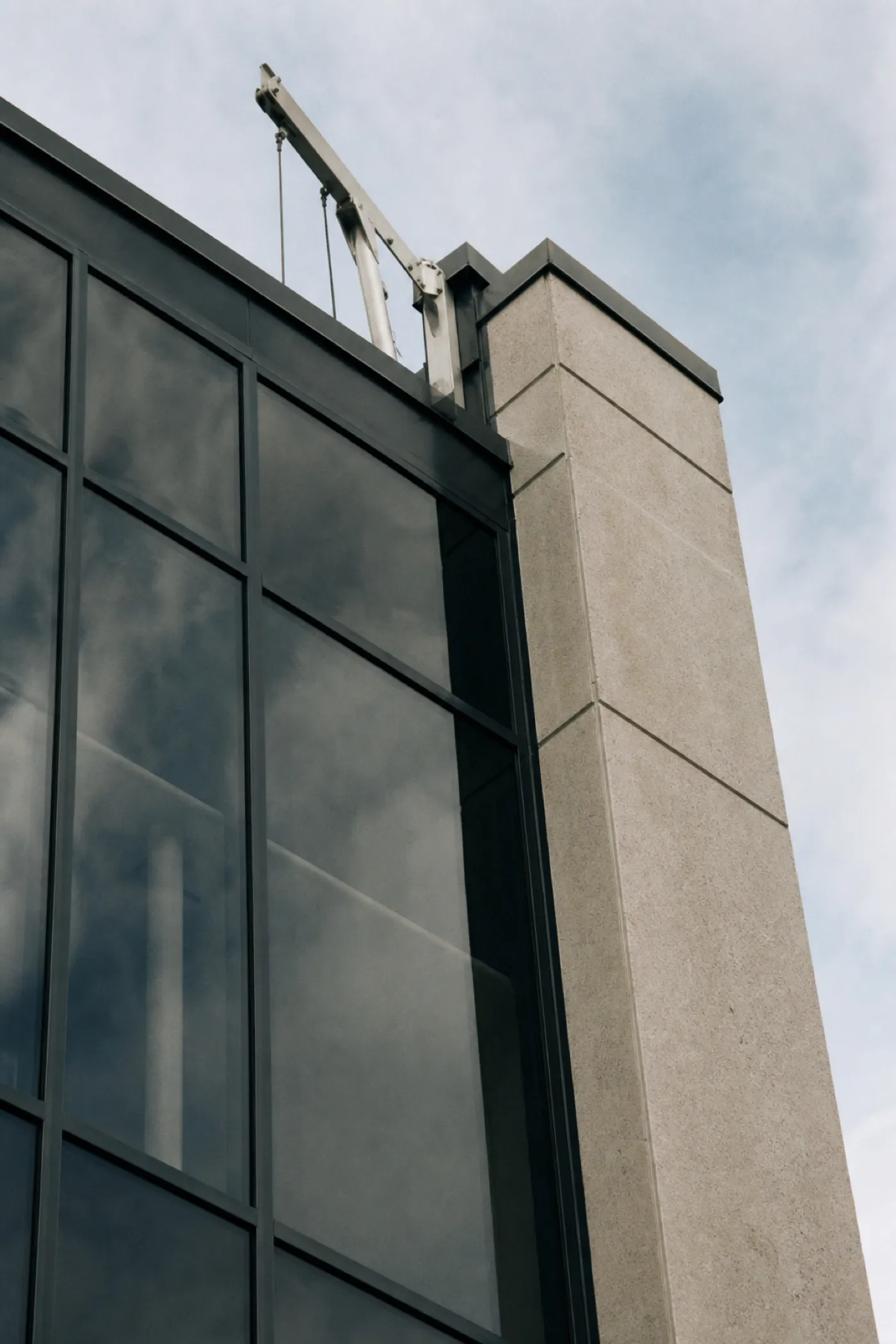 Curtain-wall facade detail of a strata office building, structure insured under strata cover