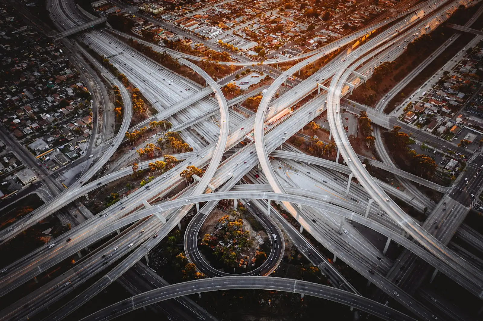 Aerial view of highway interchange in a city representing professional indemnity insurance for traffic engineers