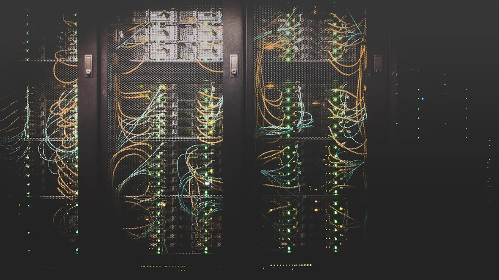 Interior of data centre with server racks and networking infrastructure