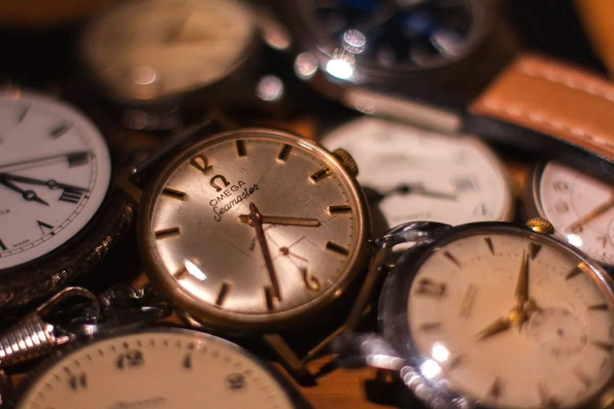 Collection of vintage watches and antique timepieces on display