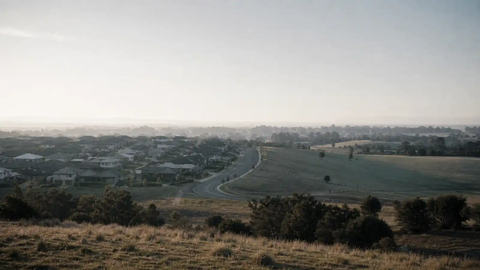 New suburb meeting open paddocks at the urban edge, growth-area work town planner PI insurance covers
